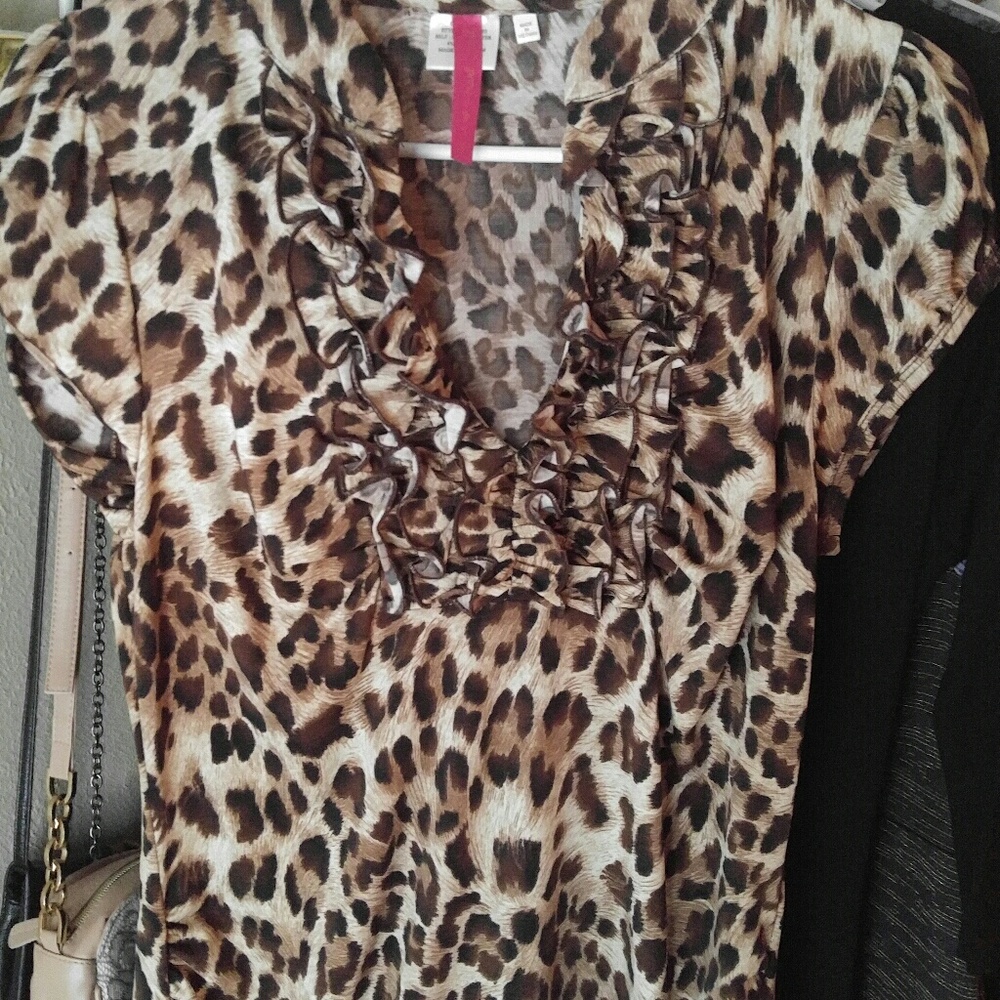 Leopard ruffled v neck blouse. Worn once. I love t